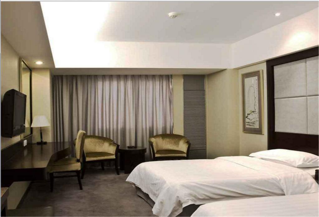 Jin'Gu Hotel Харбин Экстерьер фото